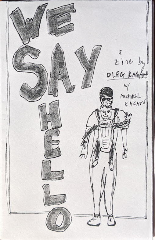 Cover of We Say Hello zine. Drawing of me with my son Michael in a baby carrier.